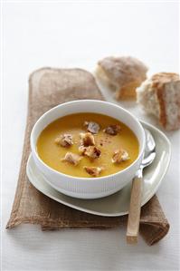 Pumpkin soup with bread cubes