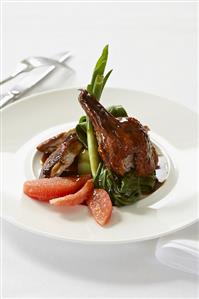 Roast duck with pink grapefruit and spring onions