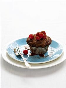 Chocolate muffin with raspberries