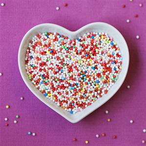Heart-shaped dish of hundreds and thousands