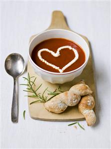 Tomato soup with a cream heart, bread