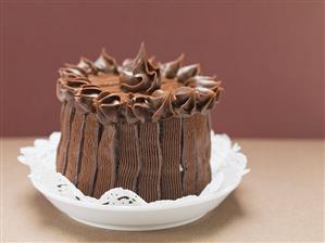 Chocolate cake on doily