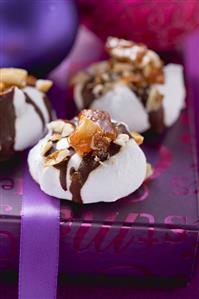 Meringues with nut brittle and chocolate for Christmas