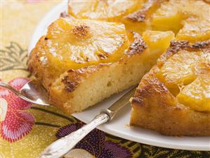 Pineapple upside-down cake, a piece cut