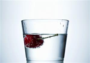 Cherry in a glass of water