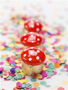 Fly agaric chocolates on confetti