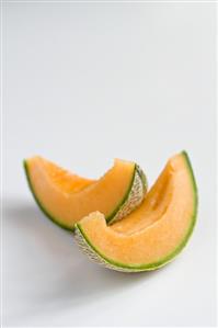 Two slices of cantaloupe melon