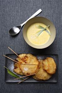 Pineapple fritters with custard