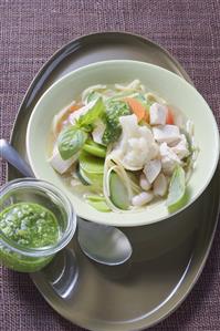 Chicken soup with vegetables and pesto