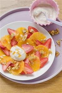 Strawberry and orange carpaccio with walnut brittle