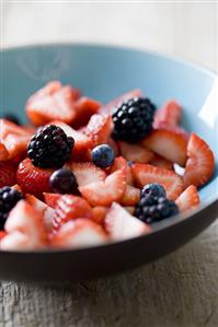 Berry salad in ceramic bowl