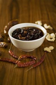 Pickled dates, nuts and chillies