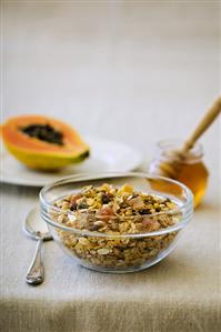 Fruit muesli with papaya and honey