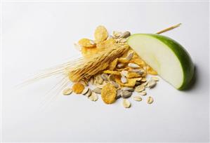 Breakfast cereal with wedge of apple and cereal ear