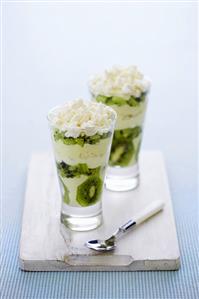 Layered kiwi fruit & mascarpone dessert with crumbled meringue