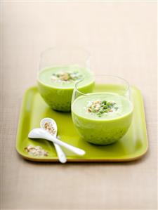 Cream of pea soup in two glasses