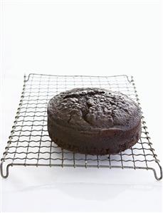 Chocolate cake on cake rack