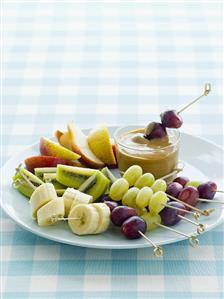 Fruit kebabs with caramel sauce