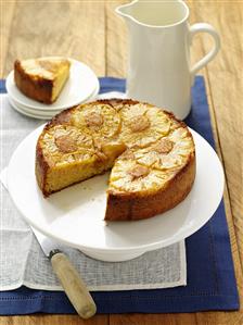 Pineapple honey cake, a piece removed