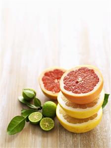 Halved grapefruits and limes