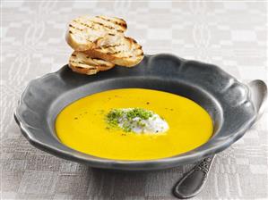 Cream of carrot soup with herb quark