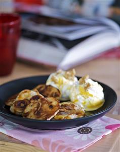 Banana and pecan pancakes with orange syrup