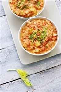 Tomato soup with celery, carrots and penne