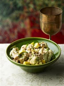 Cauliflower with apple and pumpkin seeds