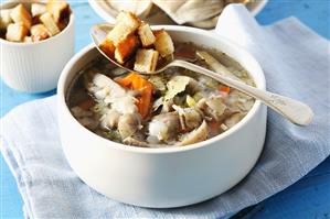 Oyster mushroom and vegetable soup with croutons