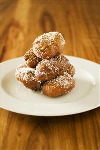 Banana fritters with grated coconut