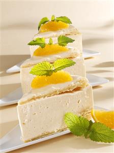 Three pieces of quick quark cake with puff pastry & oranges