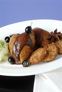 Quail with chocolate sauce