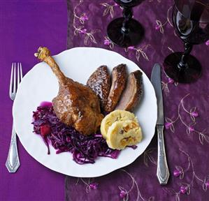 Goose with yeast dough stuffing and red cabbage with apple