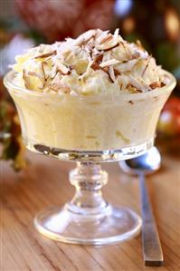 Apple dessert with cream and slivered almonds, Switzerland