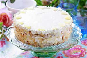 Pineapple cake with flaked almonds