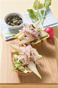 Radishes and pear on wholemeal rolls