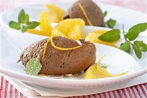 Chocolate mousse with orange segments