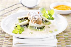 Kiwi fruit dessert with coconut sauce