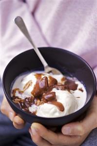 Vanilla ice cream with melted chocolate bar