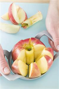 Apple with apple slicer and corer