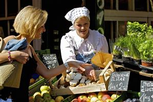 Blond woman shopping at a market