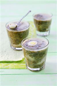 Sorrel soup with boiled egg in three glasses