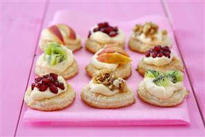 Puff pastry circles topped with fruit and walnuts