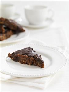 Pieces of gluten-free cake with chocolate icing