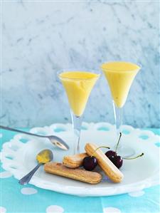 Zabaglione with sponge fingers and cherries