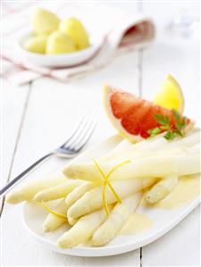 White asparagus with orange sauce