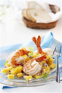 Fried prawns on mango salad