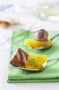 Grilled tuna with orange segments