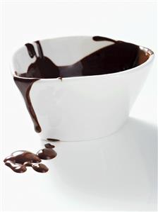 Chocolate sauce in a small dish