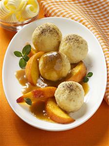 Quark dumplings with peach slices